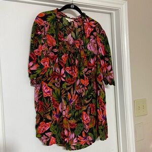 Woman’s pullover blouse with front bow.  Elastic arms